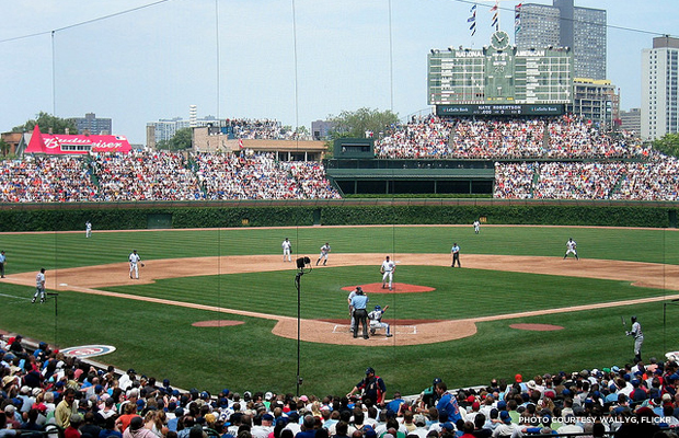 Historic Wrigley Field. Astute Cubs fans can gauge the point in the Major League season by the growth of ivy on the field’s outfield walls. Credit: wallyg, Flickr.